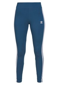 Marinblå leggings tillverkade av elastiskt tyg, med vita sidosträck och en broderad logotyp på överbenet. Slät, kroppsnära design.