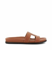 Brown leather slide sandal with two wide straps and cut-out detail, featuring a smooth upper and a flat black sole.