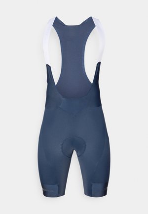 Bermudas de ciclismo azul escuro com alças brancas, apresentando um assento almofadado, textura suave e sem padrões visíveis ou detalhes em metal.