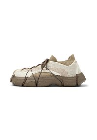 Beige and brown sneaker with a textured upper, mesh detailing, and a thick speckled sole. Features brown laces and a unique shape.