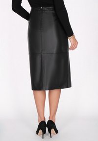 faina Wickelrock - black