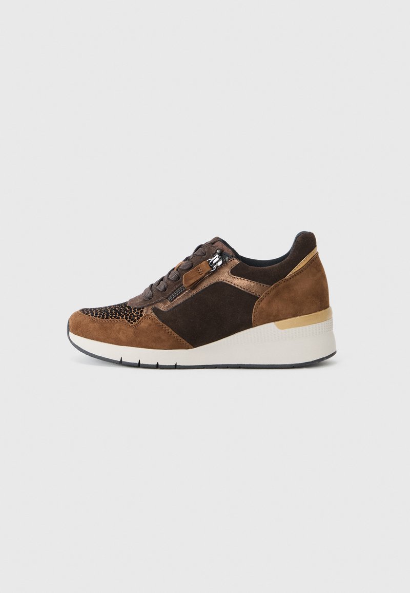 Brown suede sneakers with black accents, textured mesh upper, and a cushioned white sole. Features a side zipper for easy wear.