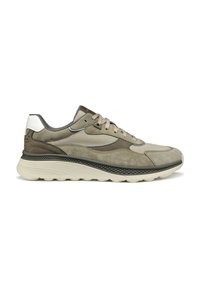 Sneakers con una toma in materiale misto in verde oliva e beige. Presentano una suola spessa e testurizzata, accenti grigi e lacci beige.