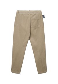 Pantaloni beige in velluto a coste con vita elasticizzata, gambe affusolate e una tasca posteriore singola. Righe testurizzate visibili su tutto il tessuto.
