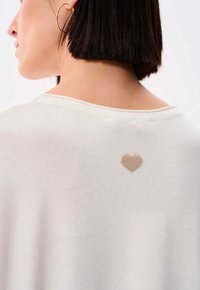 blue shadow KIONA - T-shirt basic - ecru
