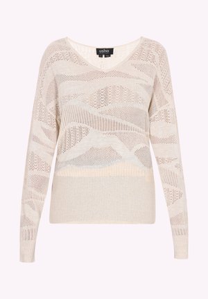 Svijetlosmeđa dukserica s V-izrezom, dugim rukavima, teksturiranim pletenim uzorkom i raznim prozirnim i čvrstim sekcijama.