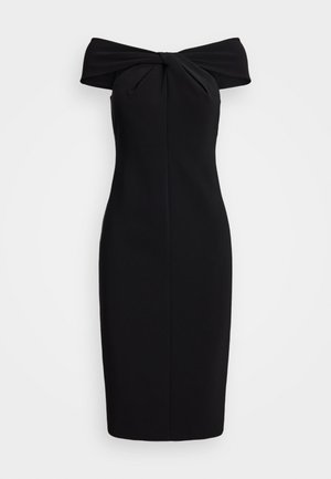 Zwarte off-the-shoulder jurk met een geknoopt detail bij de halslijn en een aangesloten silhouette, ontworpen in een soepele, rekbare stof.