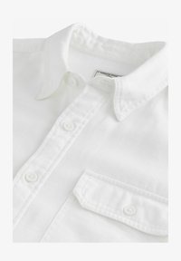 Sélectionné, white
