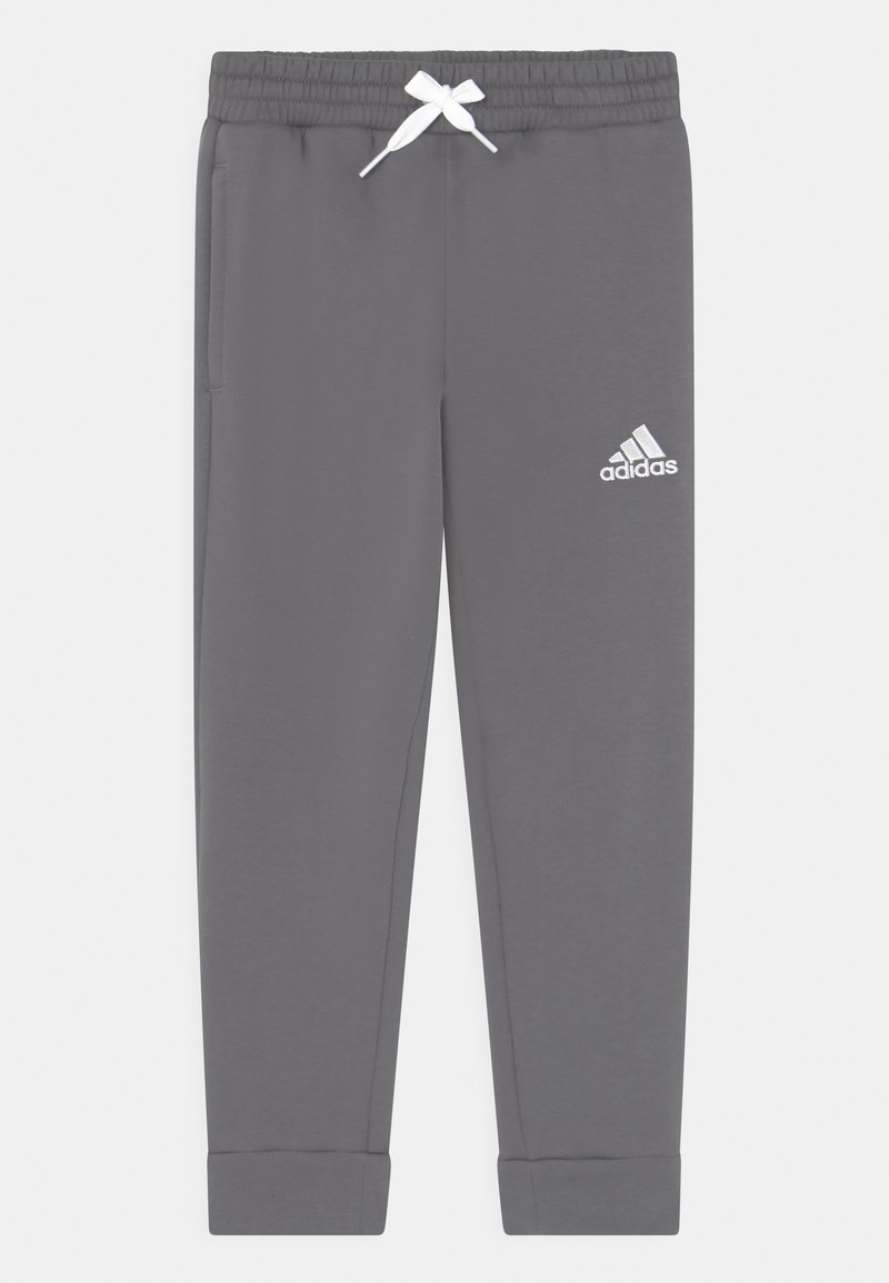 Grå sweatpants med elastisk midja och vit dragsko. Har sidofickor och en vit Adidas-logga på vänster ben.