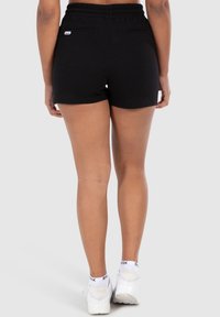 Smilodox FAYNE PRO - Pantaloncini sportivi - schwarz