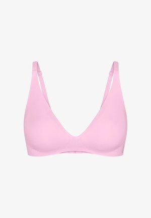 Reggiseno wireless rosa chiaro con spalline regolabili e scollatura a V profonda, progettato per comfort e vestibilità perfetta.