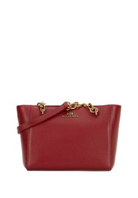 Red leather handbag with textured surface, gold chain accents, and a brand logo on the front. Features a shoulder strap for easy carrying.