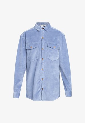 Lyseblå corduroy skjorte med lange ærmer, knaplukning foran, to brystlommer med knaplukninger og struktureret ribbet stof.