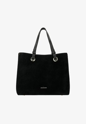 Borsa tote in suede nero con due manici neri testurizzati, hardware color oro e un design minimalista. Presenta un logo discreto alla base.