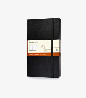 Black Moleskine Japanese album sketchbook with elastic band and paper sleeve showing product details and weight.