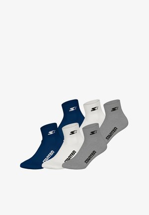 Four pairs of ankle socks: navy, white, and grey. Cotton blend, ribbed design, logo on the ankle area, and a comfortable fit.