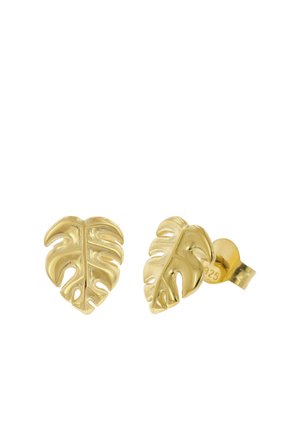 Gold-colored stud earrings shaped like Monstera leaves with detailed cutouts and a post backing.