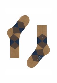 Calzini marroni con motivi geometrici in blu navy e marrone scuro. Un calzino esposto piatto, l'altro in angolazione, mostrando i dettagli del design.