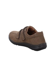 Brown suede shoe with a Velcro strap, rounded design, cushioned interior, and textured rubber sole, featuring contrast stitching accents.