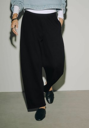 Next, TALL FIT - BARREL LEG DENIM JERSEY TROUSERS - Wide leg - black