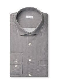 Chemise habillée homme pliée avec un petit motif géométrique, boutonnière devant et aux poignets, col italien sur fond blanc.