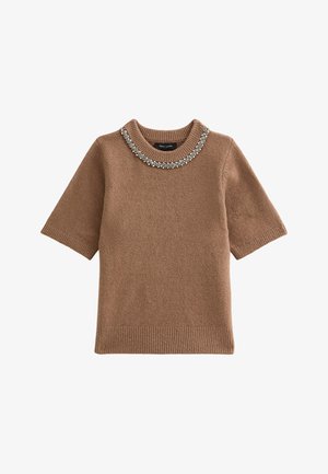 Maglione corto a maniche corte di colore marrone con scollo rotondo decorato con un accentuazione di perline. Tessuto testurizzato con dettagli a coste nell'orlo.