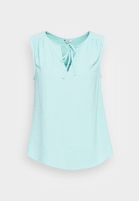 Top sem mangas azul claro com decote amarrado, feito de um tecido texturizado. Apresenta caimento suave e uma bainha arredondada.