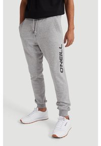Gray sweatpants with black "O'Neill" logo on the left leg, drawstring waist, and ribbed cuffs. Worn with white sneakers.