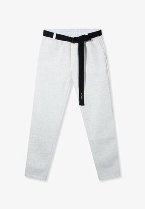 Szare spodnie dresowe o subtelnej teksturze, elastyczny pas i czarny pasek do dokładnej regulacji. Posiada boczne kieszenie i zwężane nogawki.