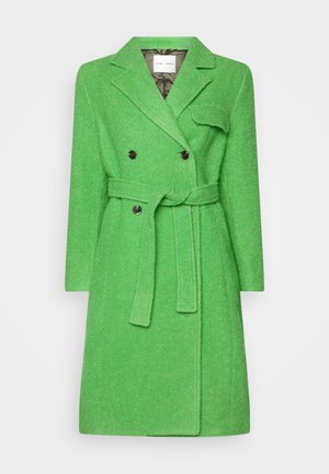 Manteau croisé en mélange de laine vert vif avec larges revers, taille ceinturée, poche à rabat et manches longues.