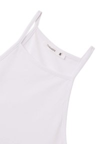Top bianco senza maniche realizzato in tessuto liscio, con spalline sottili e scollatura arrotondata. Etichetta del marchio visibile all'interno con taglia "S."