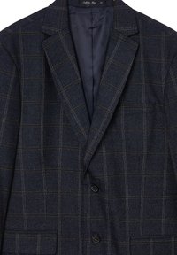 Blazer a spina di pesce blu navy con motivo a griglia, caratterizzato da un colletto a revore, due bottoni e una tasca sul petto; interno foderato in tessuto scuro.