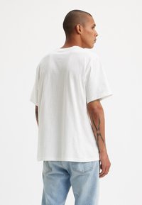 Levi's® RELAXED FIT GRAPHIC TEE - Camiseta básica - babytab camo floral white
