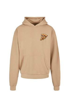 Beez värvitoon pusa pehmest kangast, millel on esikott ja vasakus rinnas pitsapalu tikand. Pikad varrukad soonikkoesega.