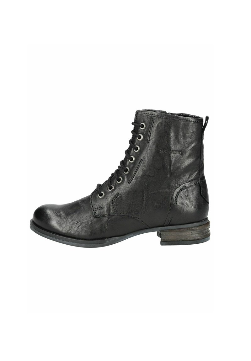 Bottine en cuir noir à lacets, à bout rond et à talon bas. Présente des détails de couture et une languette à l'arrière.