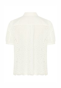 Blusa bianca a maniche corte con ricamo ad occhiello, colletto e orlo scallop. Tessuto leggero con una finitura testurizzata.