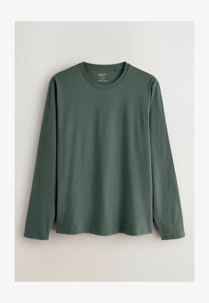 Camicia a maniche lunghe di colore verde scuro, realizzata in tessuto morbido. Presenta un collo a giro e un orlo dritto senza motivi o dettagli visibili.
