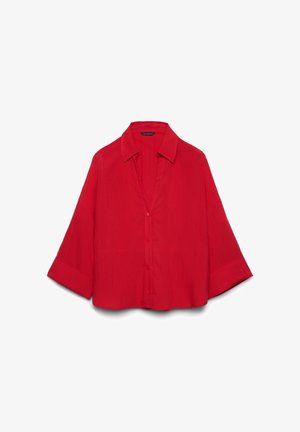 Camicia rossa con bottoni, maniche larghe e colletto, vestibilità ampia, mostrata su sfondo bianco.