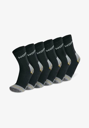 Six pairs of black socks with ribbed texture, gray heel and toe accents, and yellow stripes on the sole. "WORK" printed in white on the cuff.