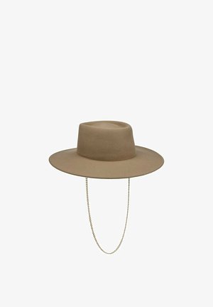Wide-brimmed beige felt hat with a tall crown and attached thin gold chain hanging below the brim.
