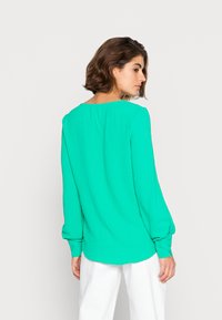ONLY ONLMETTE UMA - Camisola de manga comprida - simply green