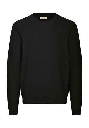 Černý svetr z žebrovaného úpletu s kulatým výstřihem a dlouhými rukávy. Na dolním lemu se nachází malý štítek, který zdůrazňuje jeho texturovanou tkaninu.