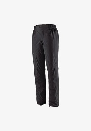Pantalones impermeables negros con cintura elástica, bolsillos laterales con cremallera, piernas ajustadas y textura suave. Adecuados para actividades al aire libre.