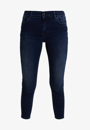 Dark blue denim skinny jeans with a high waist, classic five-pocket design, and a small metal button at the waist. Smooth texture.