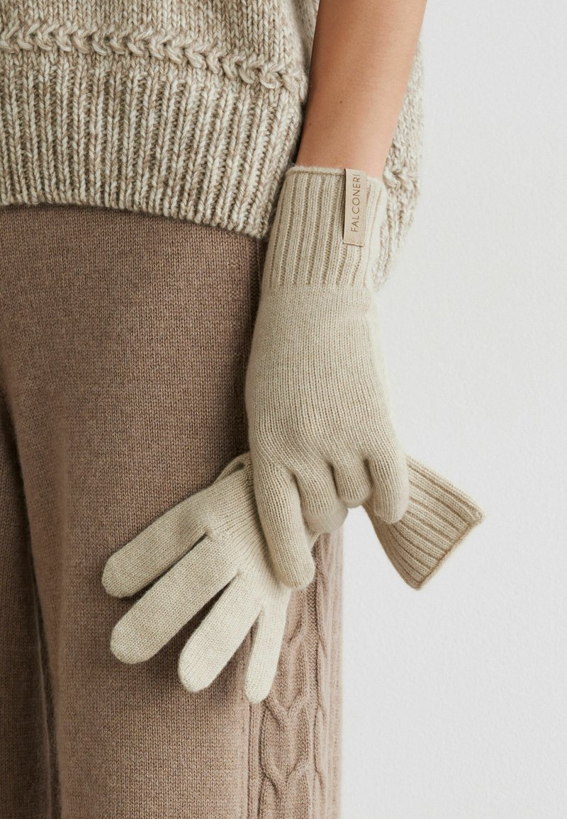 exfolieren handschuhe Peeling-Handschuh aus natürlichen Hanffasern für den Körper I CARTEL product-family:Notepad bye to your rough Rear light option:ReePower™ Constant 3 Möglichkeiten, Eier frisch