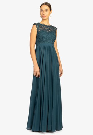 Tealfarbene Abendkleid mit einem Spitzenoberteil, kurzen Ärmeln und einem fließenden, plissierten Rock. Verfügt über eine taillierte Taille und elegante Designelemente.
