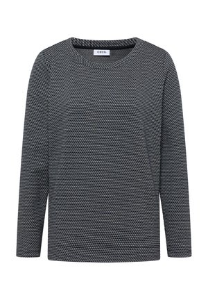 Maglione a maniche lunghe in bianco e nero con un piccolo motivo geometrico e scollatura rotonda.