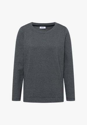 Black and white long-sleeve knit sweater with a small geometric pattern and a round neckline.