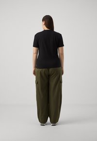 Calvin Klein Jeans - T-shirt z nadrukiem