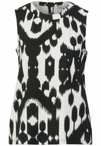 Sleeveless top featuring a black and white ikat pattern, round neck, soft fabric, and a flowy silhouette with a slightly longer back.